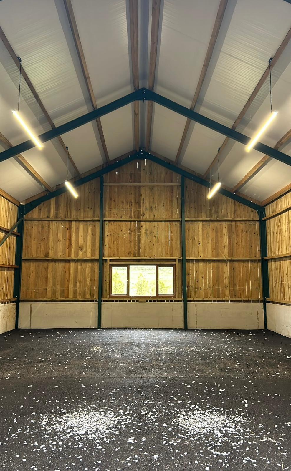Commercial LED batten lighting installed in barn structure in Surrey