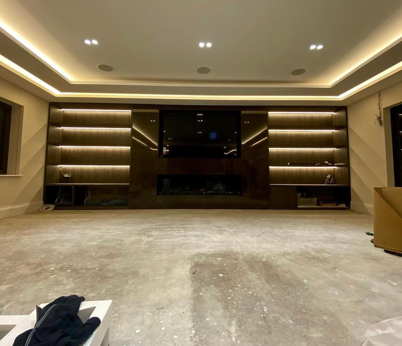 Completed electrical installation with LED shelving and downlights in Surrey home